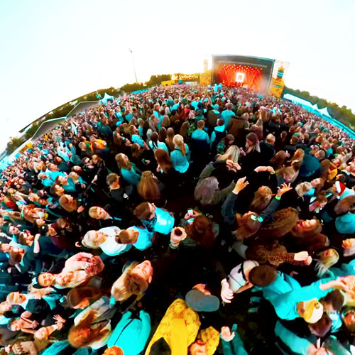 Fisheye view of people at a house festival